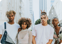 A group of young adults posing for a photo.